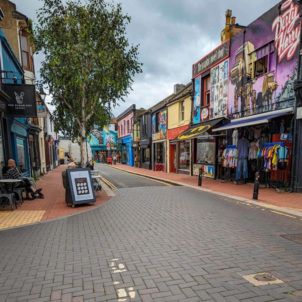 One of the streets of downtown Brighton lined with colorful shops and cafes