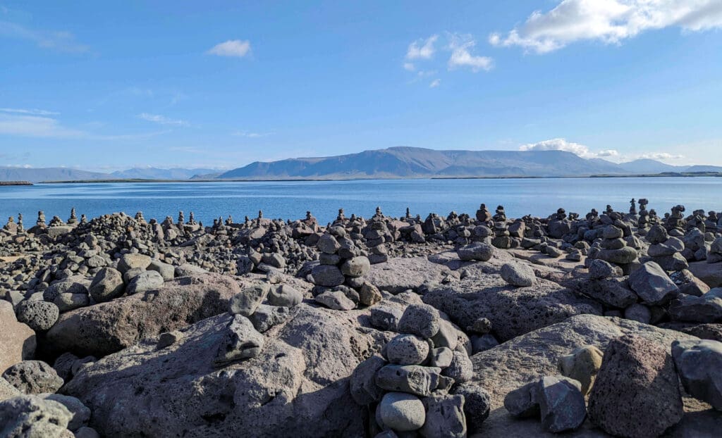 Hundreds of rock towers in the Galicany Rock Garden overlooking the bay and distant mountains