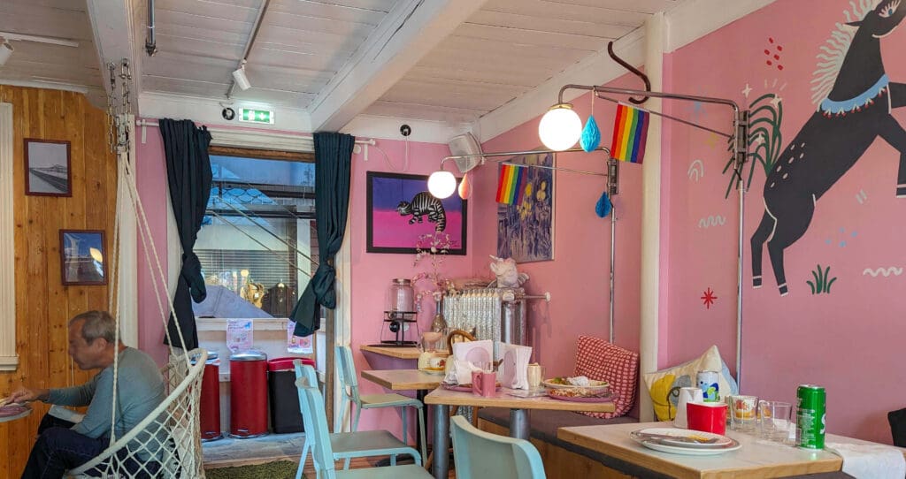 Fun pink colored walls of the Sæta Húsið breakfast restaurant famous for their bubble waffles