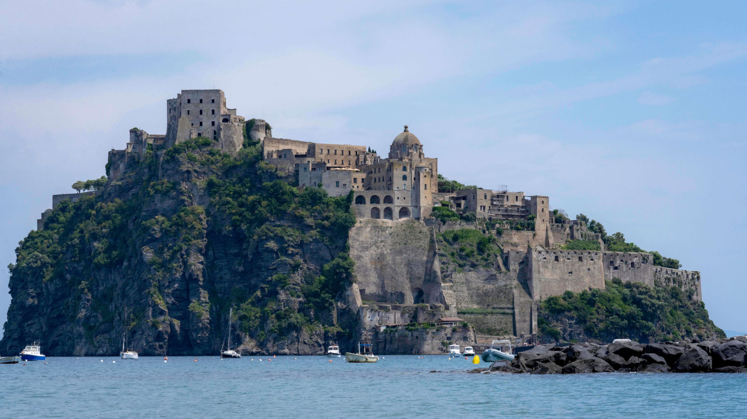 The small offshoot island connected to Ischia Island featuring the expansive Aragonese Castle 