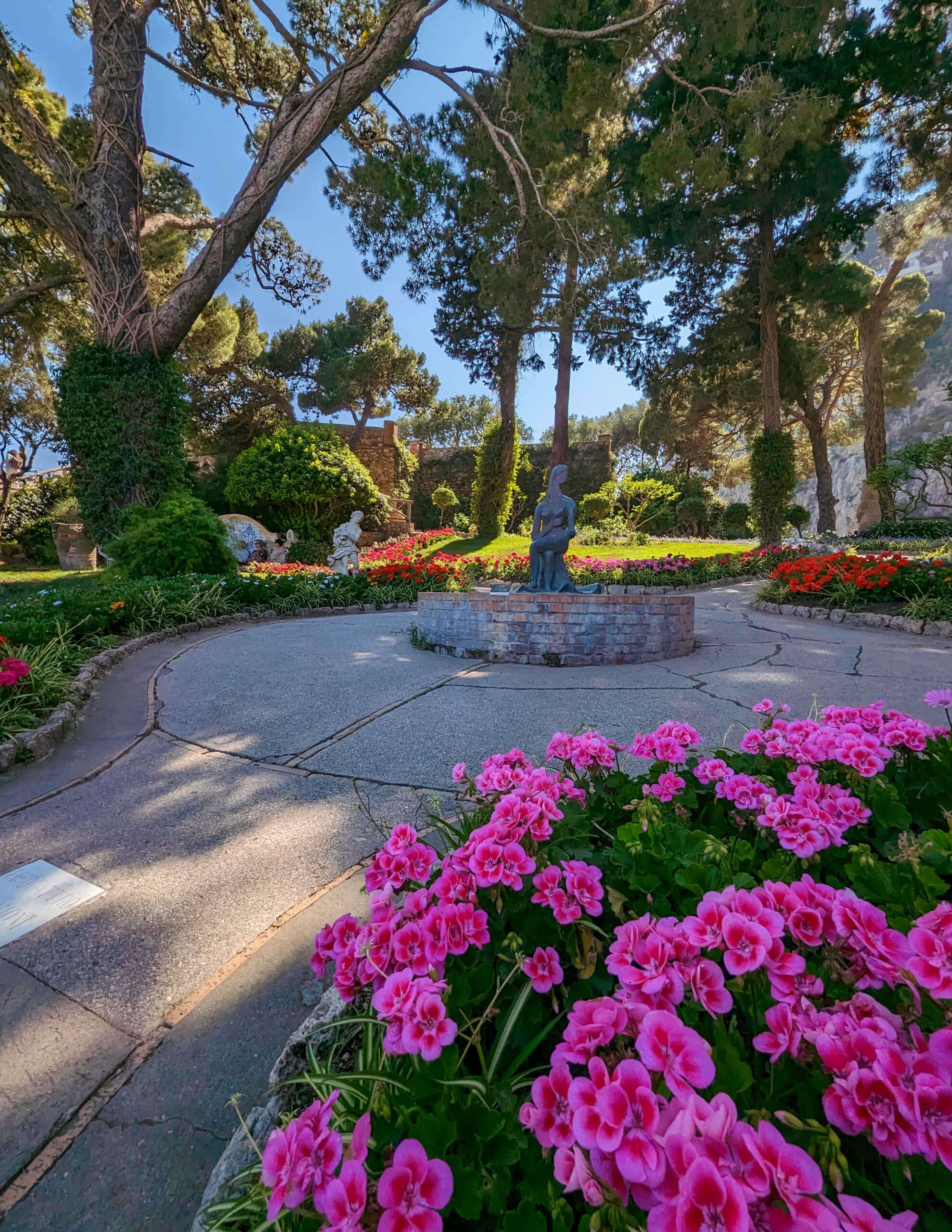 Lovely flowers and ivy covered trees make up the open and inviting Giardini di Augusto on Capri Island