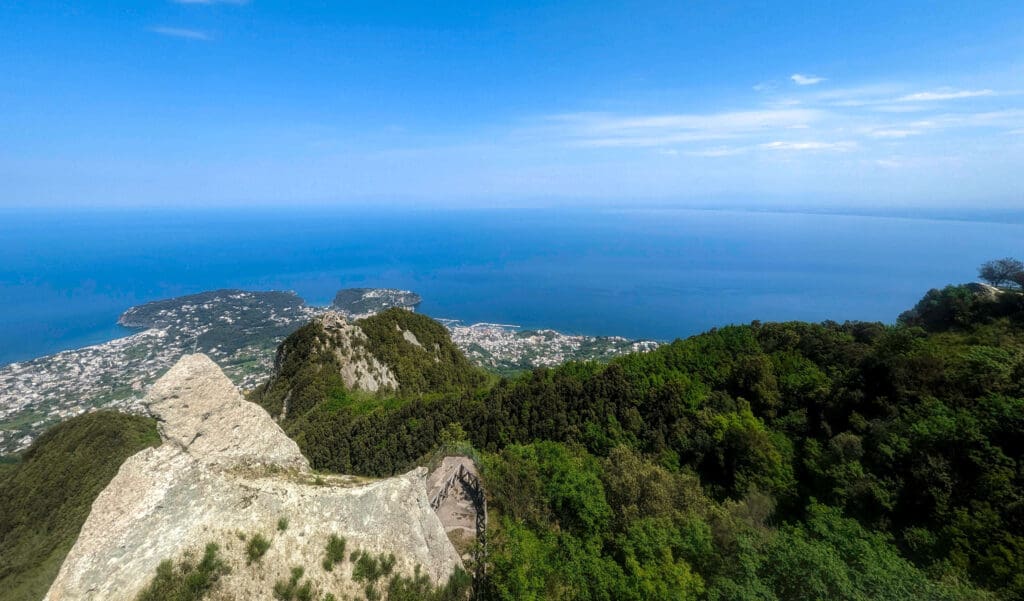 Standing atop Mount Epomeo overlooking the forests, all of Ischia Island, and the warm surrounding oceans