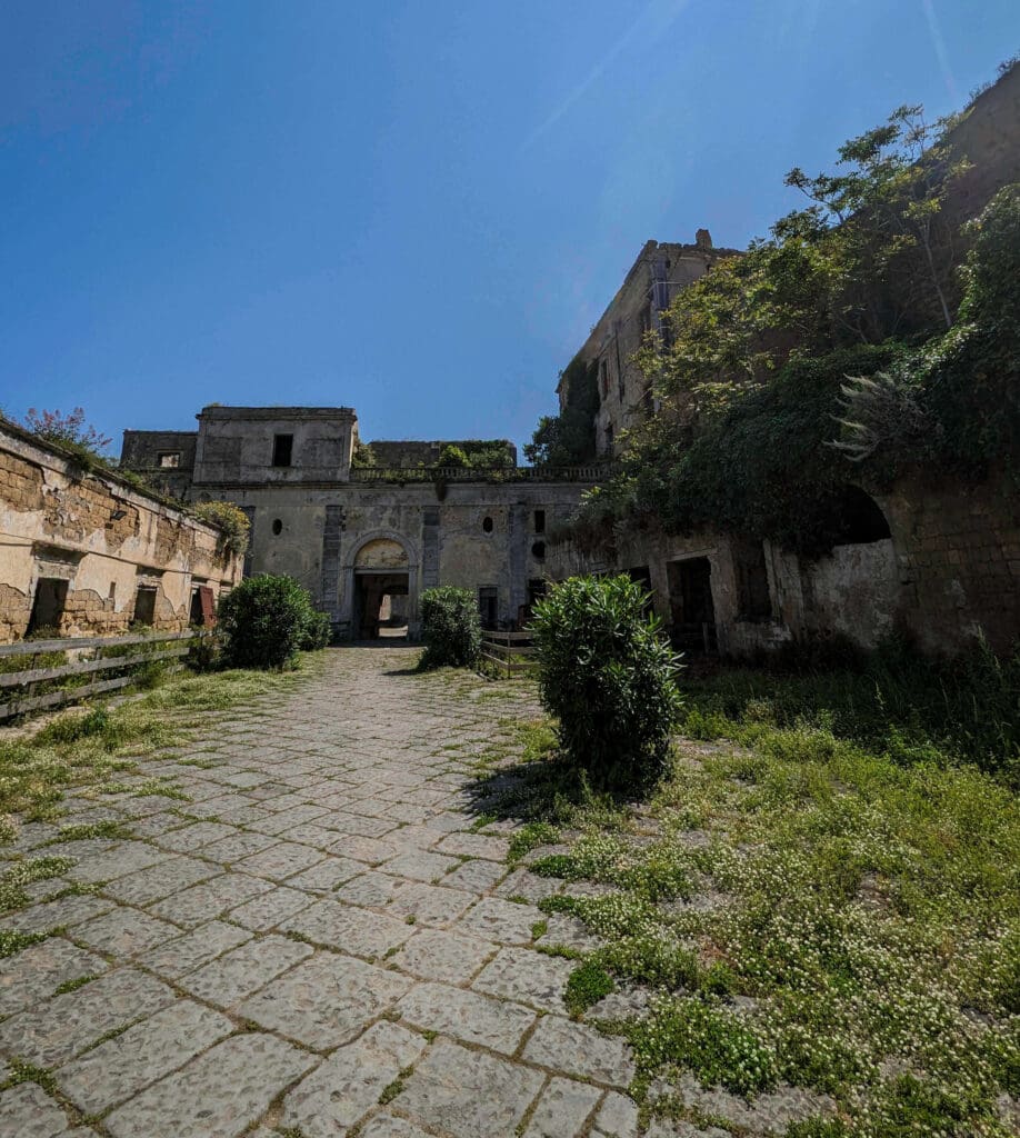 The worn ancient ruins of roman castles found on Procida Island are now becoming overgrown with lush vegitation