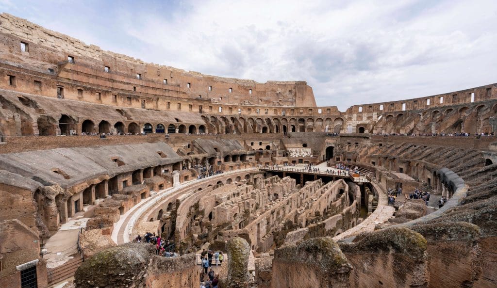 Centuries old stone structures make up the magnificent oval structure of the Colosseum in Rome