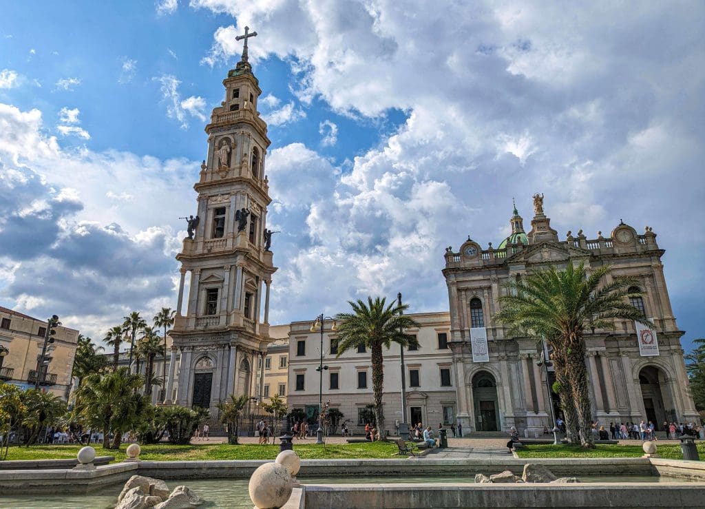 Looking onto the gorgeous church and fountain of the town square in modern Pompei