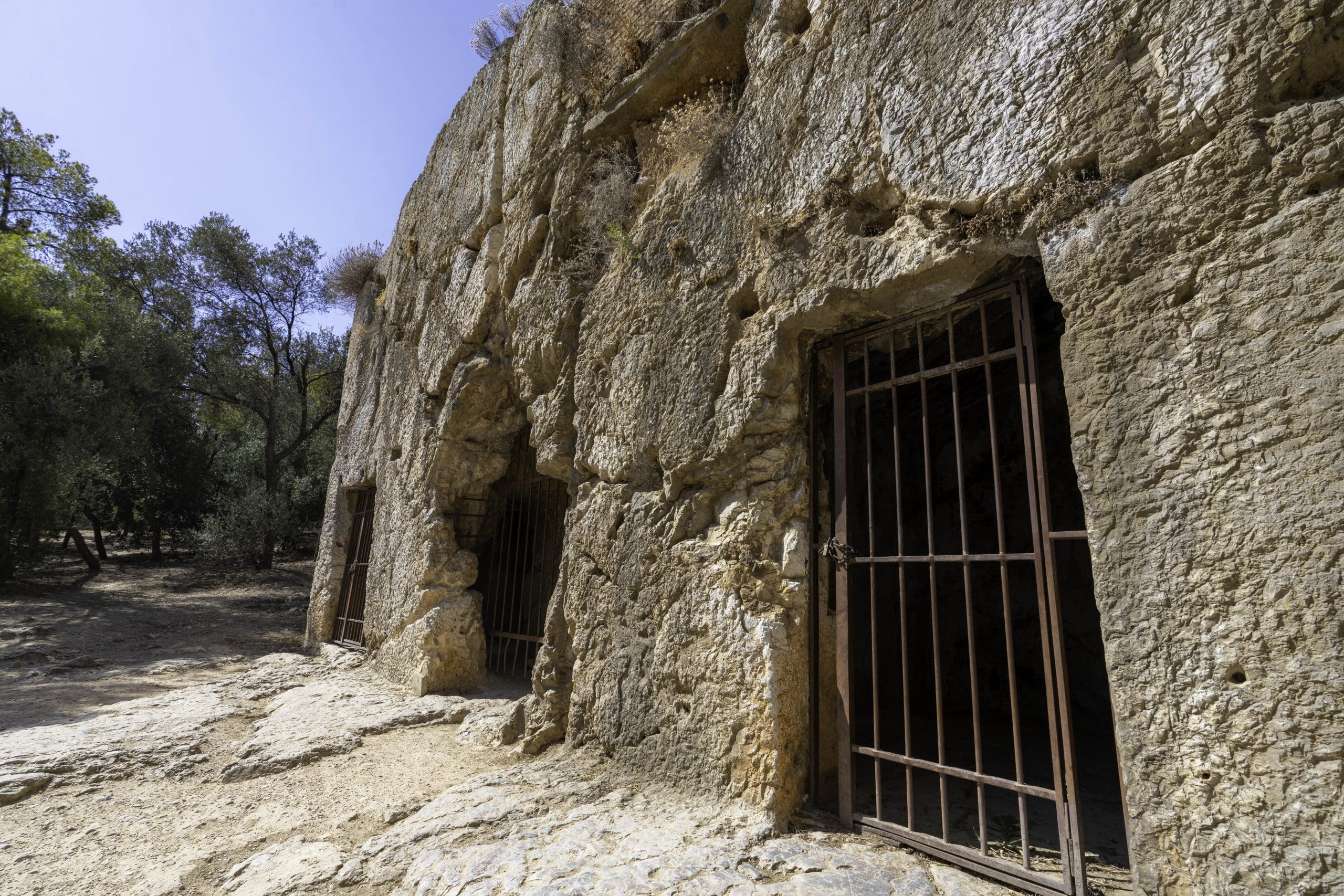 The ancient cave-like structure stands as the prison where Socrates was jailed at the center of Athens.