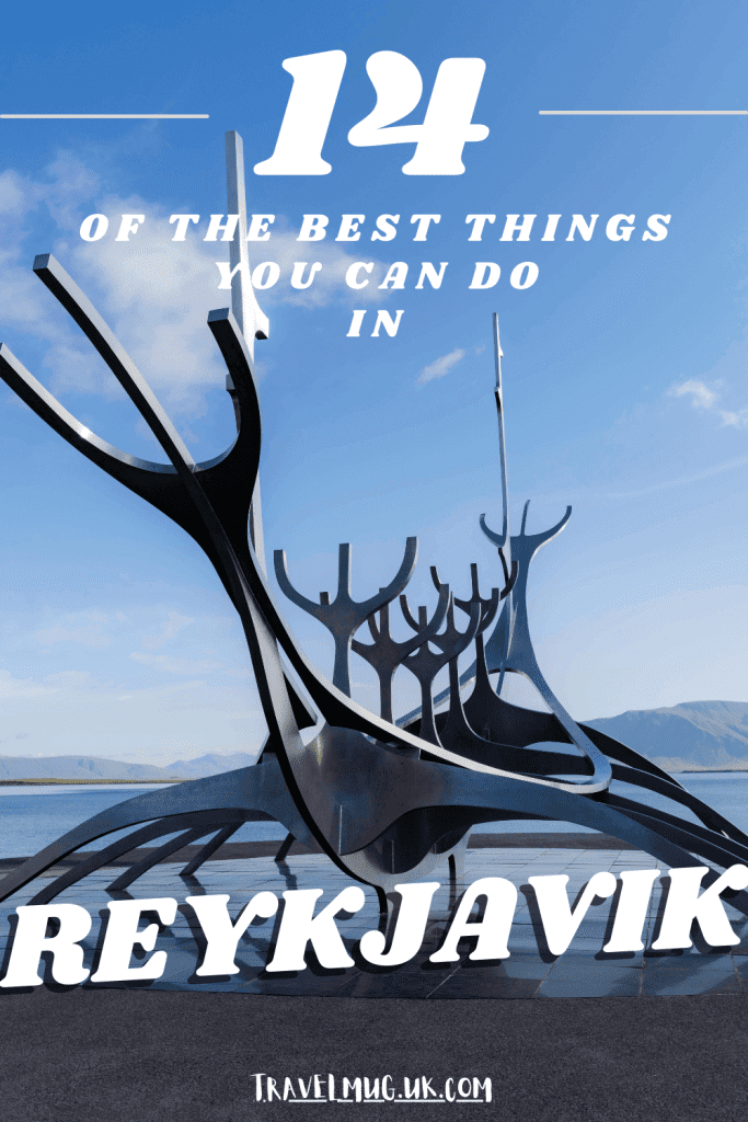 Looking on the metallic sleek ship like statue with the bay behind it, with the title of the article "14 of the best things you can do in Reykjavik".