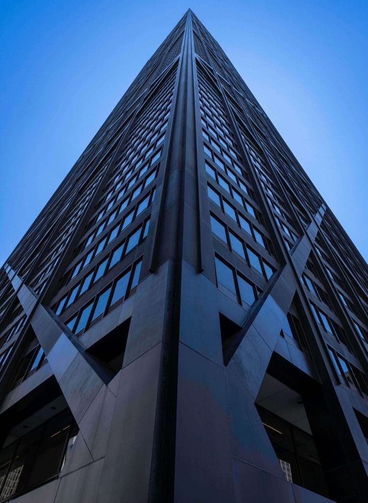 Looking up at the 875 North Michigan Avenue Chicago building from street level an example of the best architecture in Chicago.