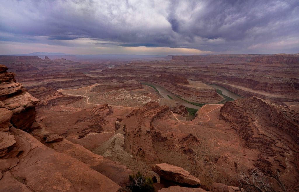 The Colorado River cuts through the landscape creating deep canyons at Dead Horse Point, one of the best spots for Utah pictures.