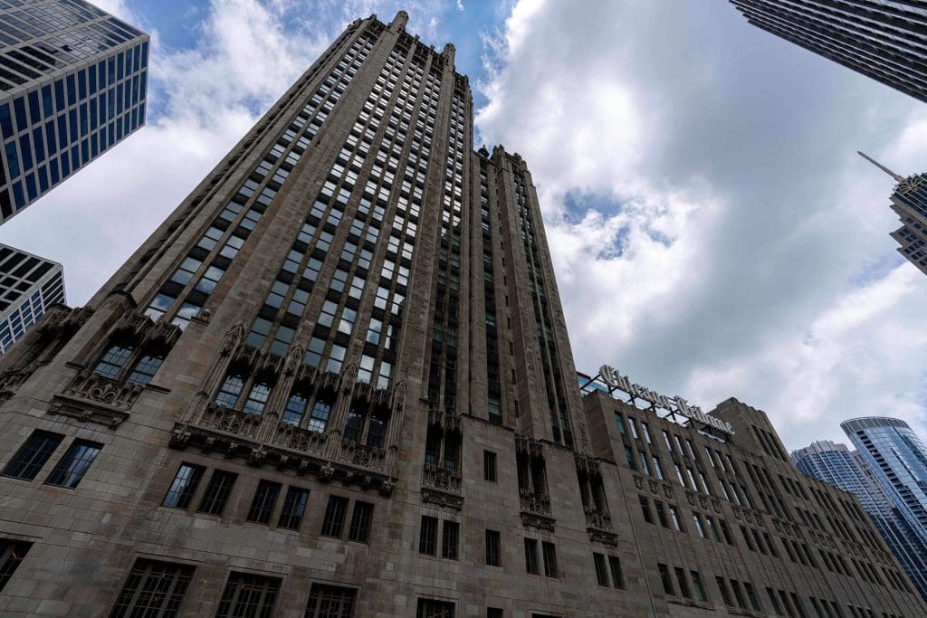 Long lines of the Tribune Tower draw focus toward the jagged Gothic peaks across from the Wrigley Building.