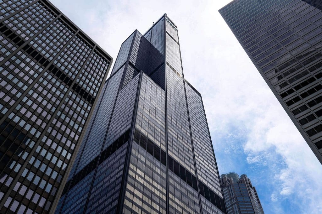 Staring up at the striking size of the Willis Tower, a prime example of the best Chicago architecture.