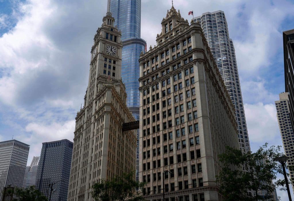 The Wrigley Building's two towers standing in the urban landscape.