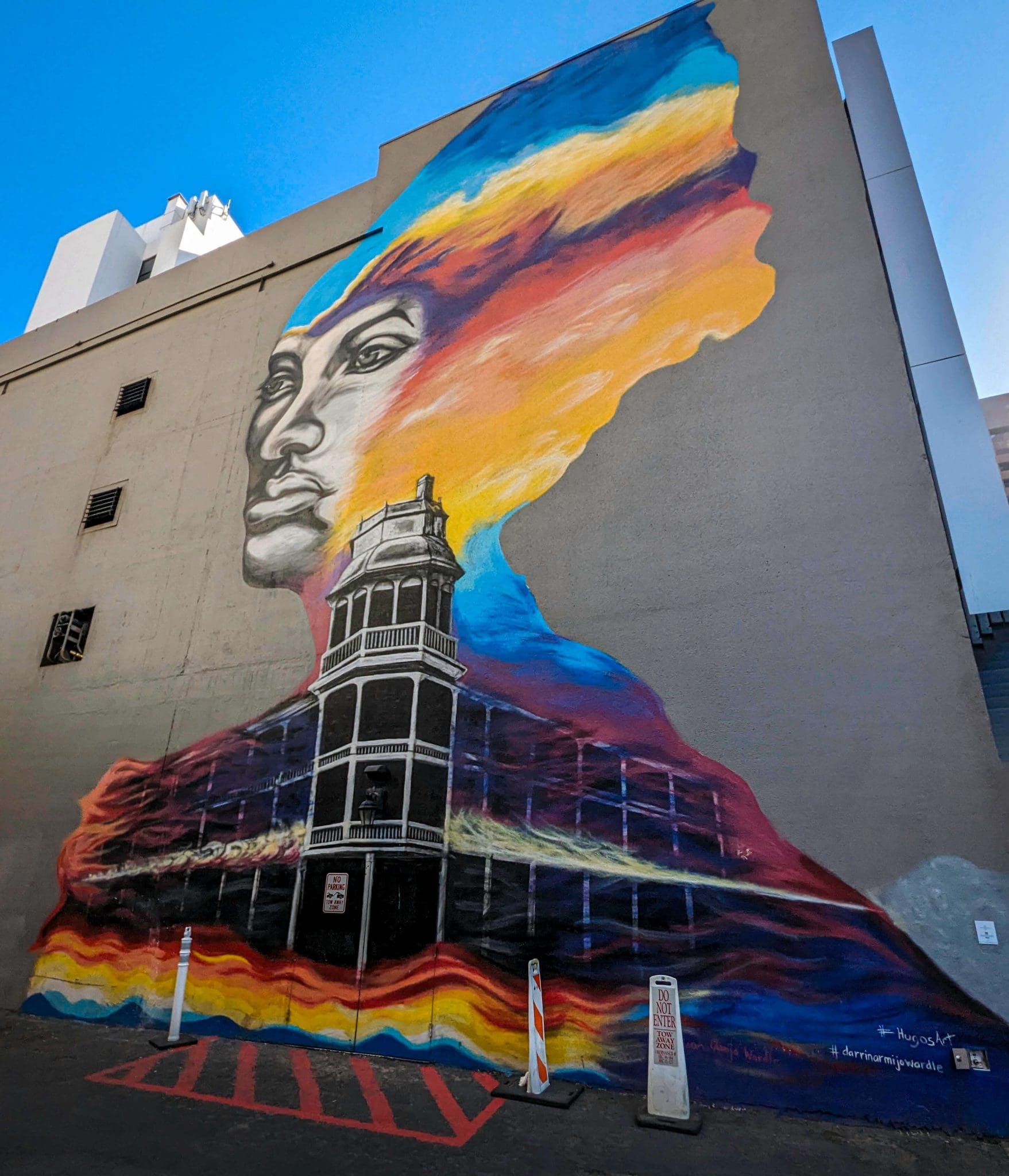 The colorful graffiti art depiction of Malinda and the old Phoenix hotel.