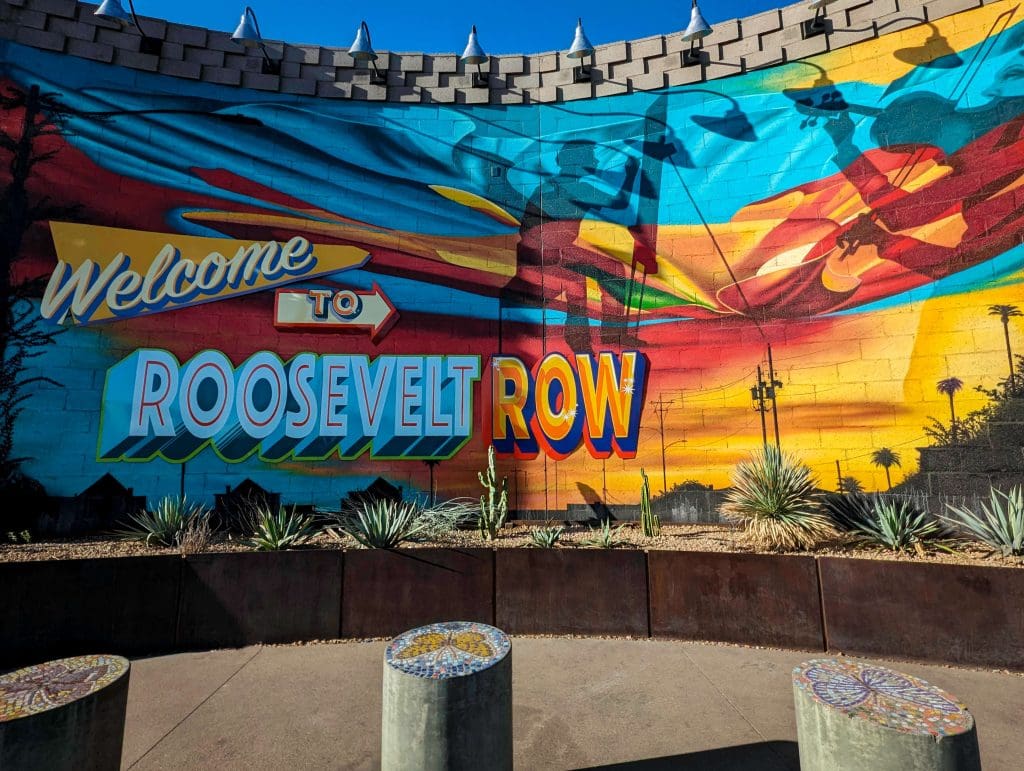 A colorful mural represents the beginning of the great times find on Roosevelt Row, one of the best places in Phoenix.