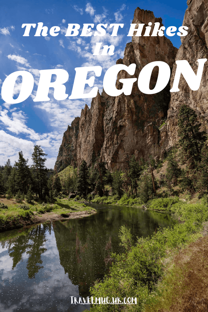 Flowers line the River Trail with towering rocks in the background, with the title of the article "the best hikes in Oregon".