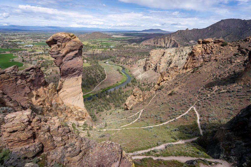 A steep trail runs up the mountain from the peak of Misery Ridge trail at Smith Rock State Park, one of the best hikes in Oregon.