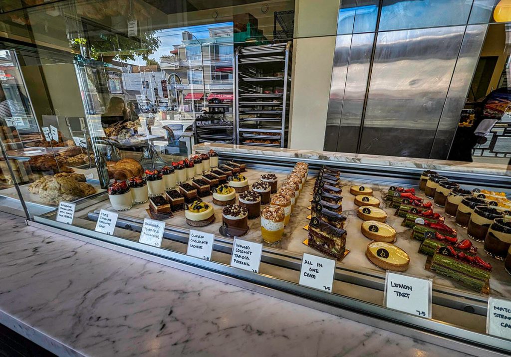 A case full of different delicious desserts and pastries at B Patisserie.