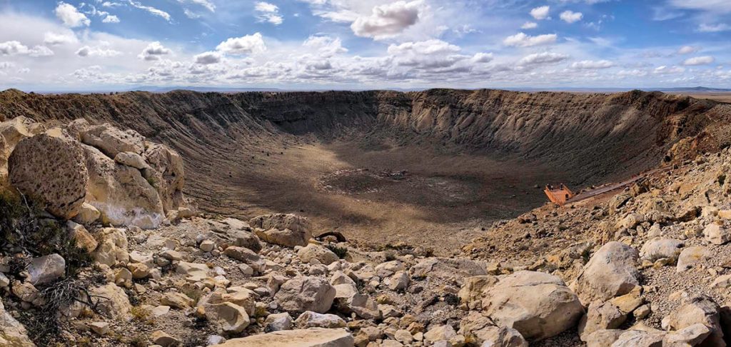 The near mile wide open crater of Meteor Crater marking the impact site is a very unique thing to do in Arizona.