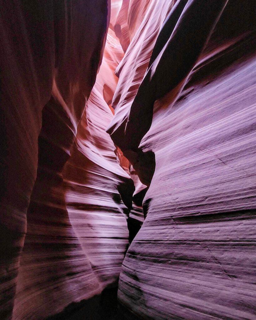 Smooth canyon walls of vibrant colors make up the Upper Antelope Canyon a top spot for Arizona pictures.