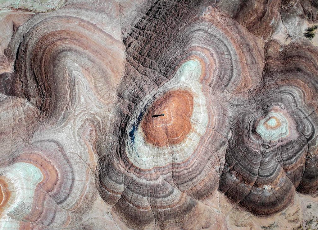 A top down view of the colorfully painted Bentonite Hills with its vibrant shades.