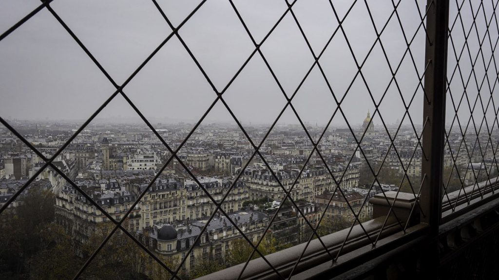 Looking out onto the expansive Paris city from the 2nd level of the tower.