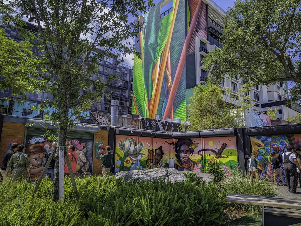 Vibrant colors and decorations make up the walls and buildings of Wynwood, a fun Miami itinerary spot.